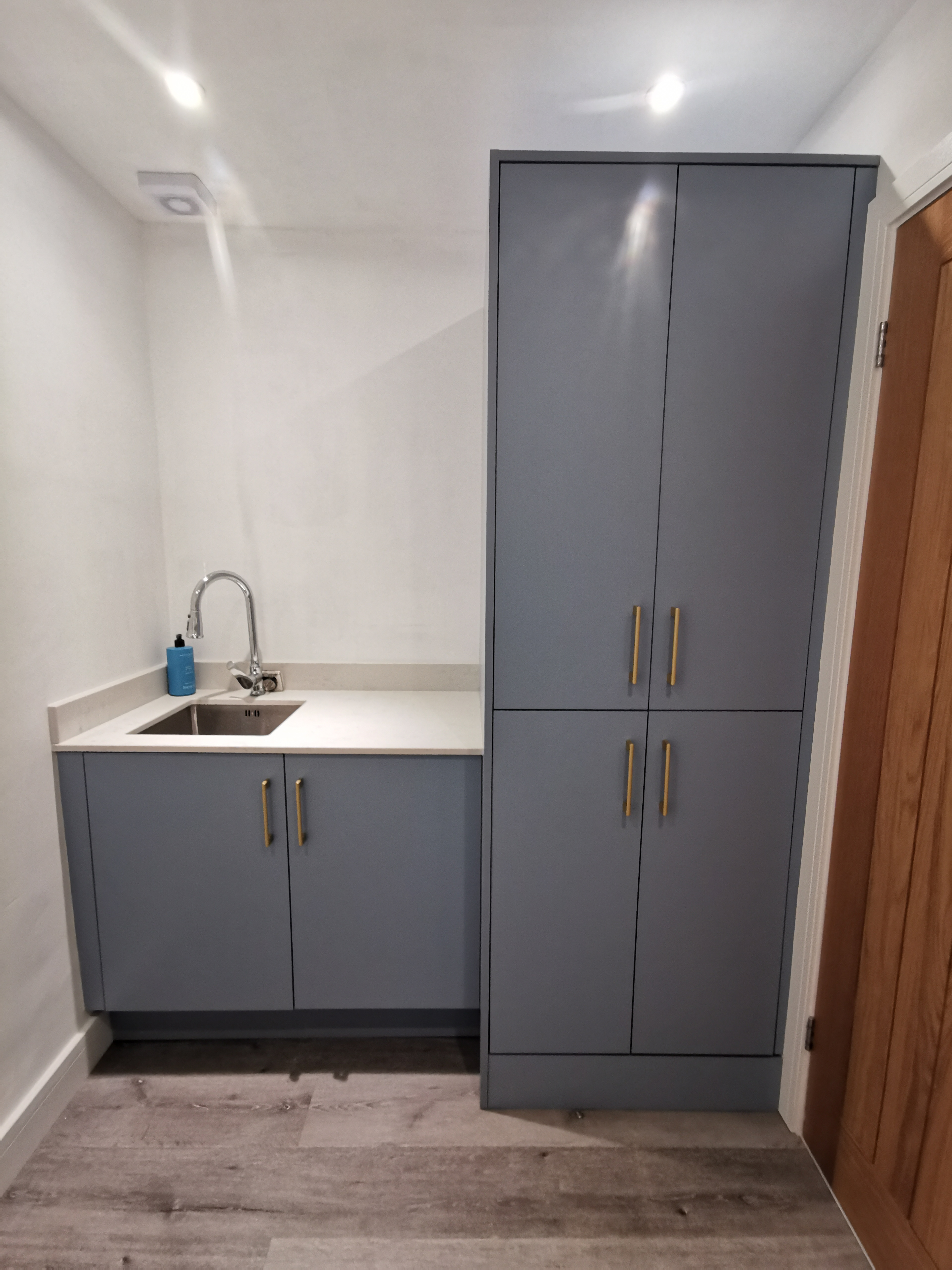 Grey Utility Room with Gold Handles